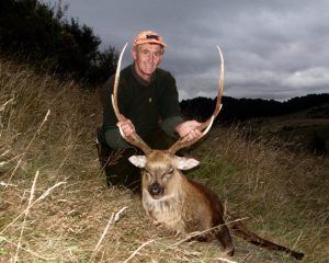 Hunter posing with his trophy